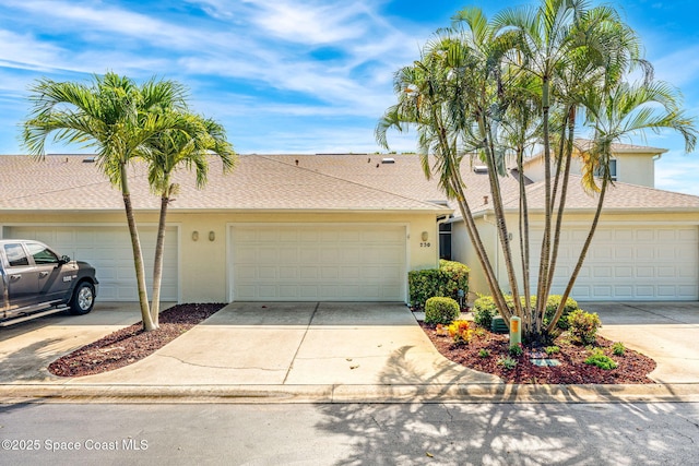 single story home with a garage