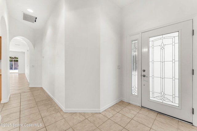 entryway featuring light tile patterned floors