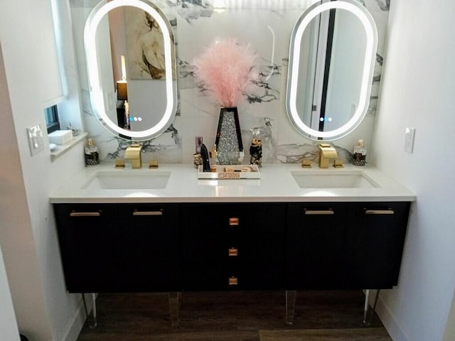 bathroom featuring vanity and decorative backsplash