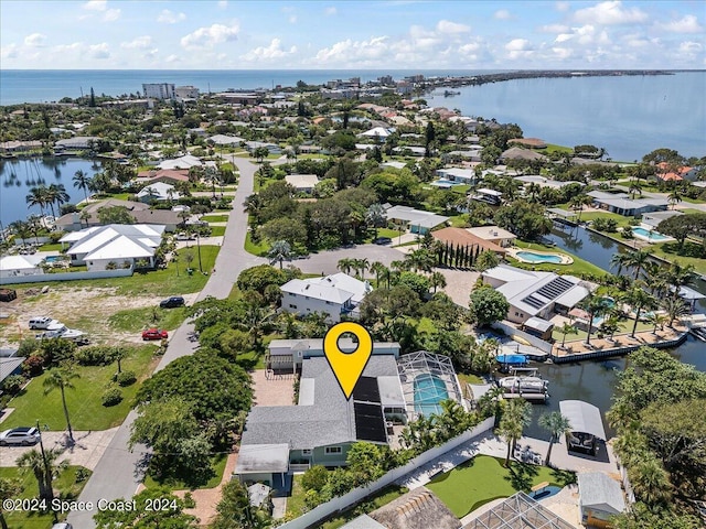 aerial view with a water view and a residential view