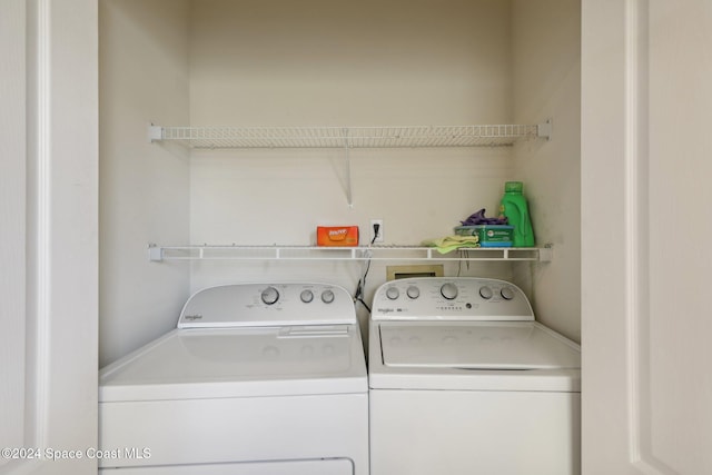 laundry area with independent washer and dryer and laundry area