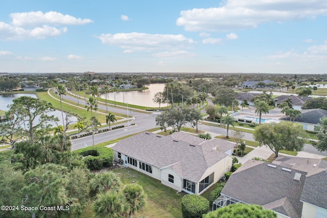 aerial view with a residential view and a water view