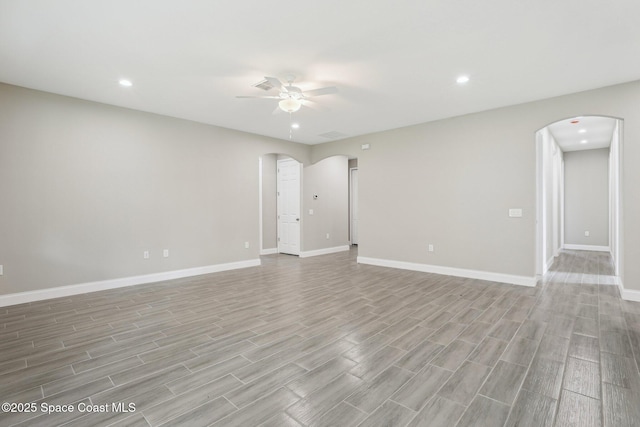 unfurnished room featuring ceiling fan and light hardwood / wood-style floors