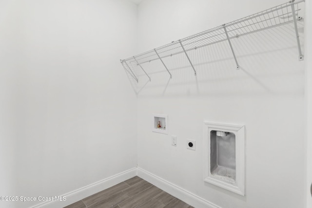 clothes washing area featuring washer hookup, hardwood / wood-style floors, and hookup for an electric dryer