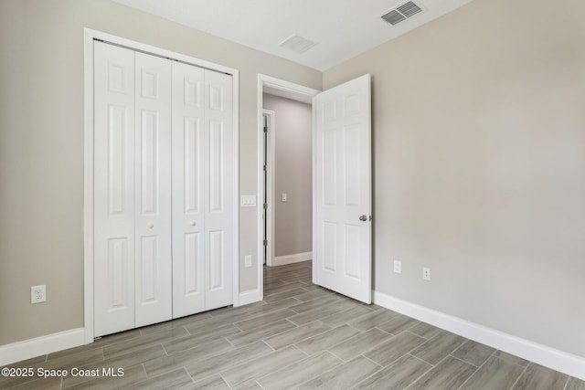 unfurnished bedroom featuring a closet