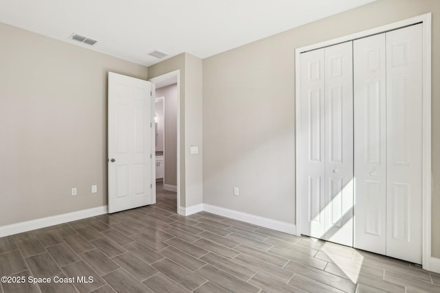 unfurnished bedroom featuring a closet