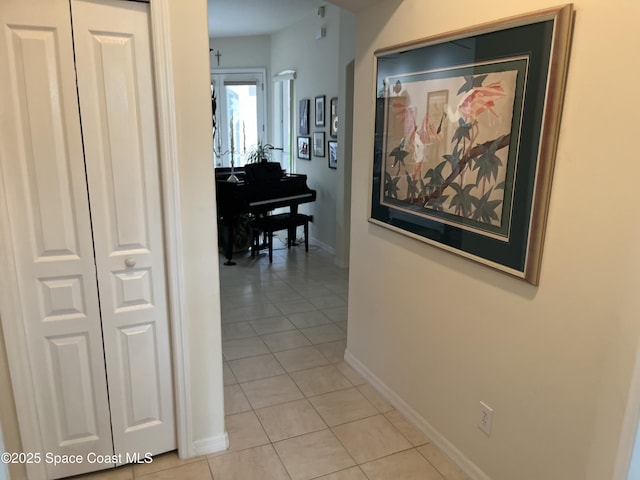 184 Tramore Pl, Melbourne Beach, FL 32951 - hall with light tile patterned flooring and baseboards