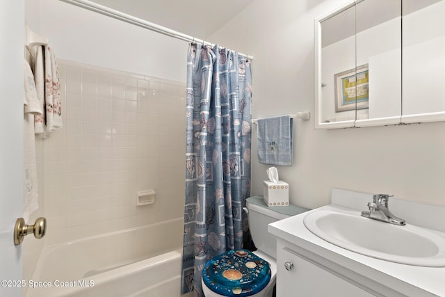 bathroom with shower / bathtub combination with curtain, toilet, and vanity