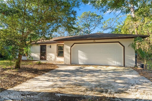 ranch-style home with a garage