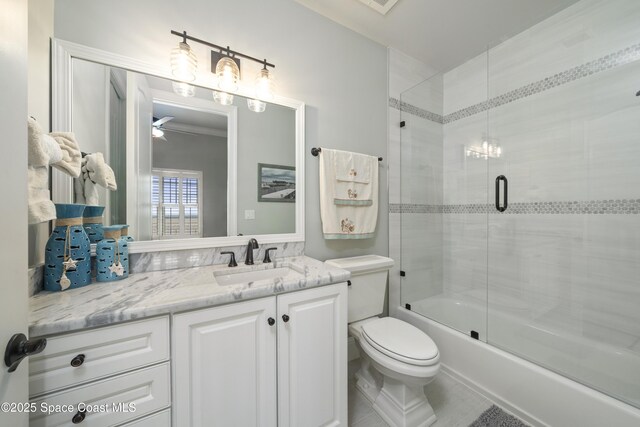 4955 Dixie Hwy NE Unit 801, Palm Bay, FL 32905 - bathroom with vanity, tile patterned floors, toilet, and shower / bath combination with glass door