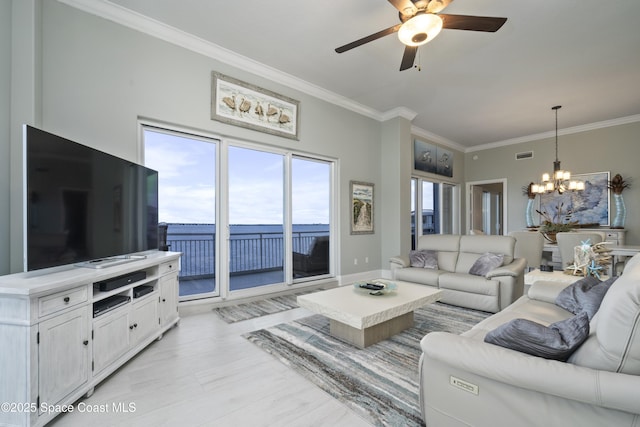 living area with crown molding, light wood-style flooring, ceiling fan with notable chandelier, and visible vents