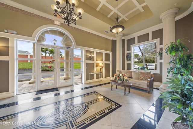 4955 Dixie Hwy NE Unit 801, Palm Bay, FL 32905 - interior space featuring tile patterned floors, baseboards, a high ceiling, and ornate columns