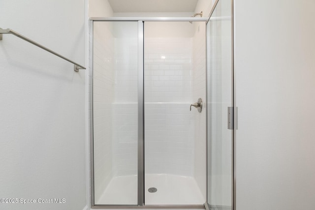 bathroom featuring an enclosed shower