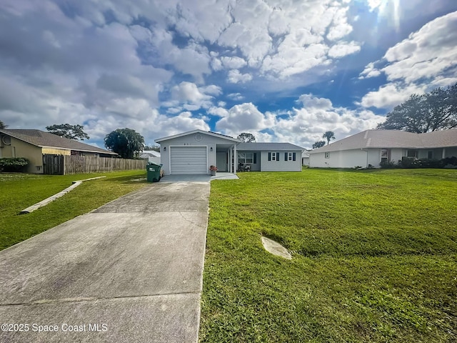 ranch-style home with driveway, a garage, fence, and a front lawn