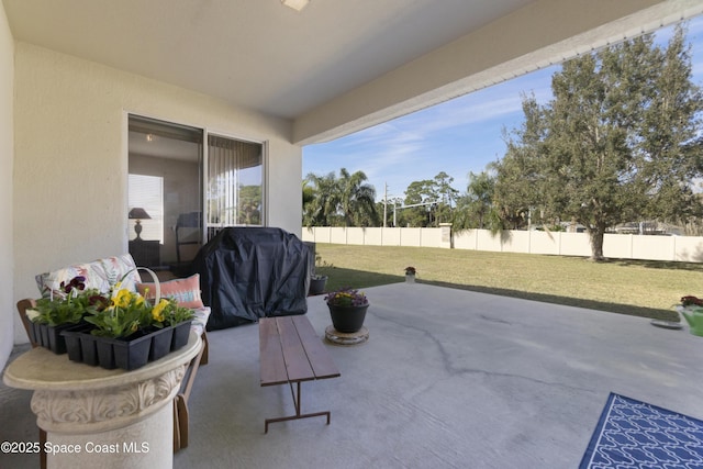 view of patio featuring grilling area and a fenced backyard