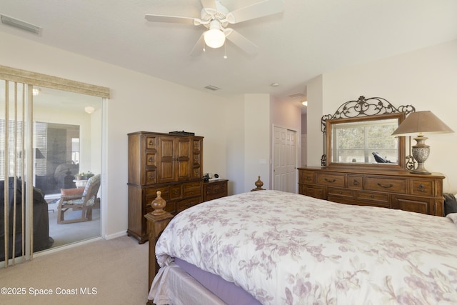 bedroom featuring light carpet, access to exterior, ceiling fan, and visible vents