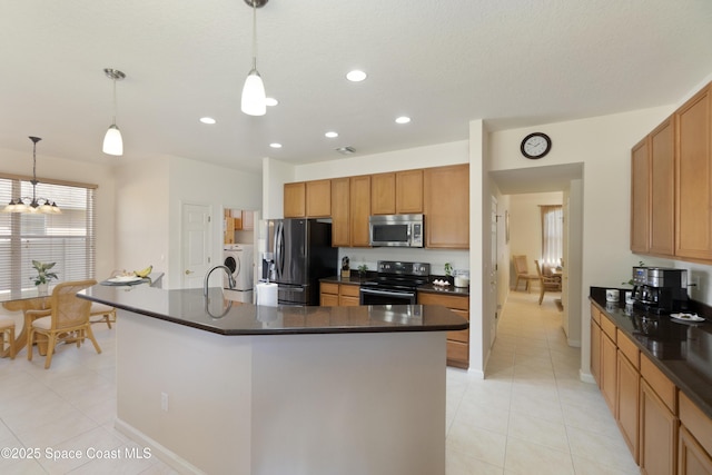 kitchen featuring range with electric stovetop, dark countertops, stainless steel microwave, hanging light fixtures, and fridge with ice dispenser