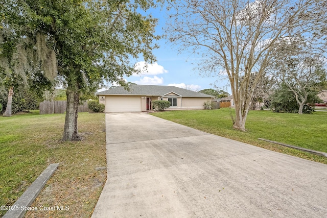 ranch-style house with a garage and a front lawn