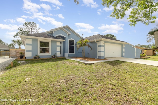 view of front of property with a front lawn and a garage