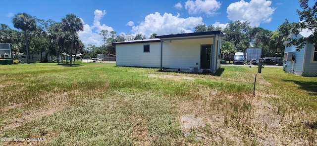 217 Teal Dr, Cocoa, FL 32926 - back of property with a yard
