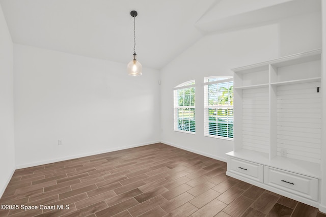 mudroom featuring lofted ceiling