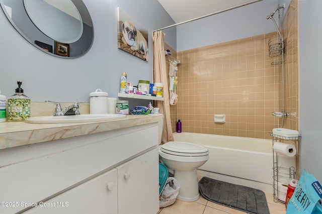 full bathroom with tile patterned flooring, toilet, vanity, and shower / bathtub combination with curtain