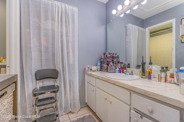 bathroom with vanity and tile patterned floors