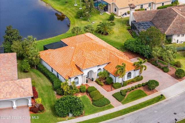 aerial view featuring a water view and a residential view