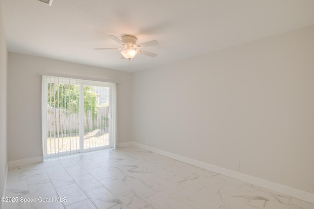 spare room featuring ceiling fan