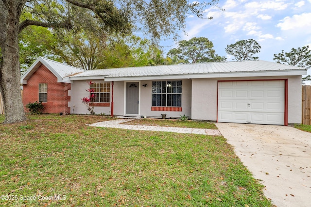 ranch-style home with metal roof, a garage, driveway, stucco siding, and a front lawn