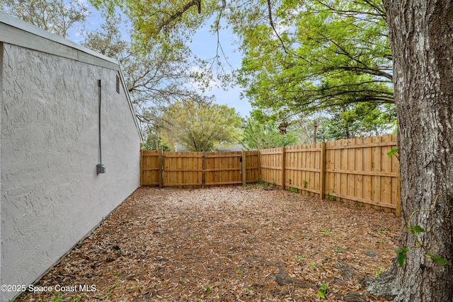 view of yard featuring a fenced backyard