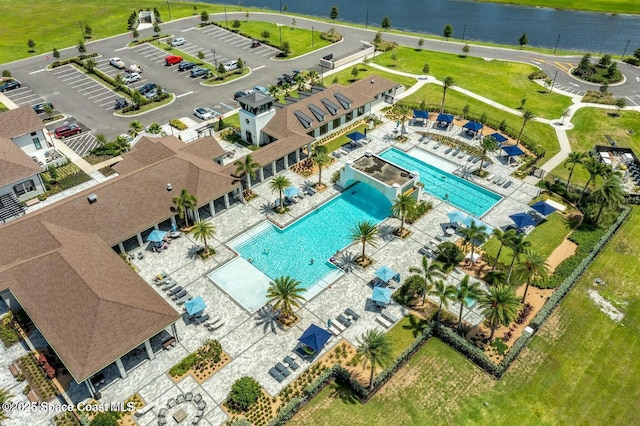 bird's eye view with a water view