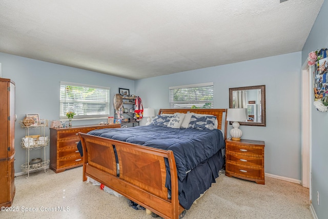 bedroom featuring a textured ceiling