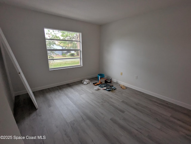 unfurnished bedroom featuring hardwood / wood-style flooring