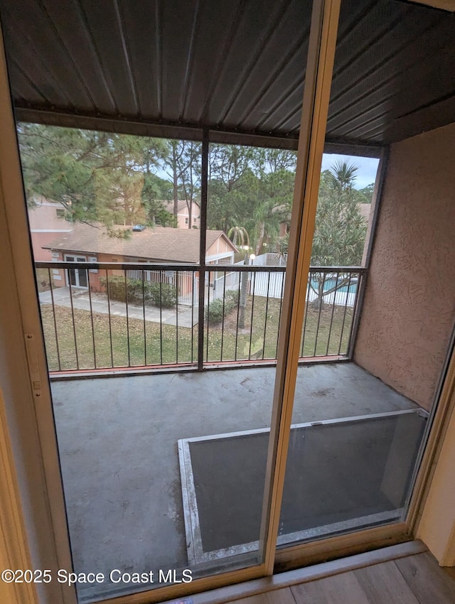 unfurnished sunroom featuring plenty of natural light