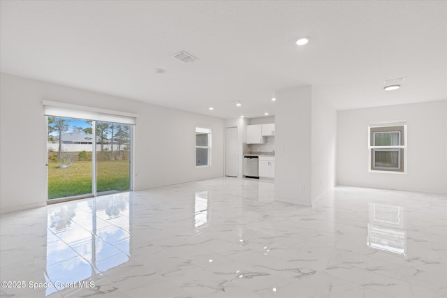 unfurnished living room featuring baseboards, marble finish floor, visible vents, and recessed lighting