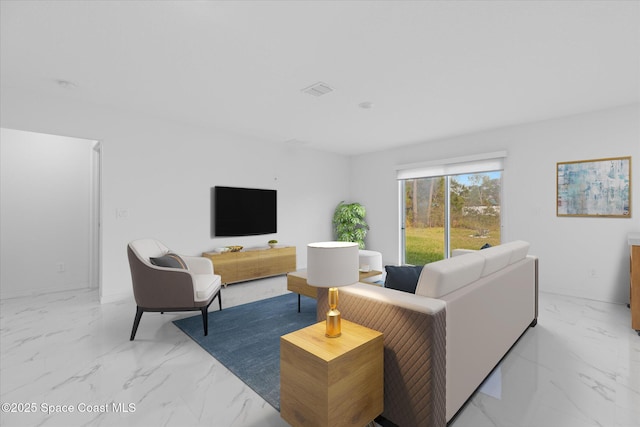 living area with marble finish floor