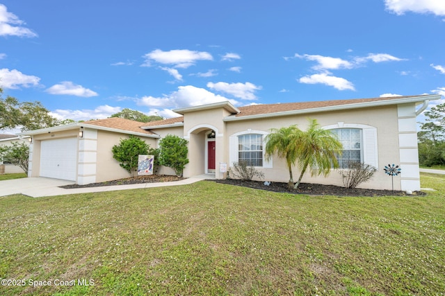 mediterranean / spanish-style home with a garage and a front yard