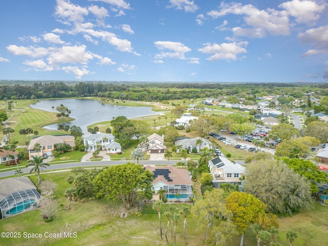 bird's eye view featuring a residential view and a water view