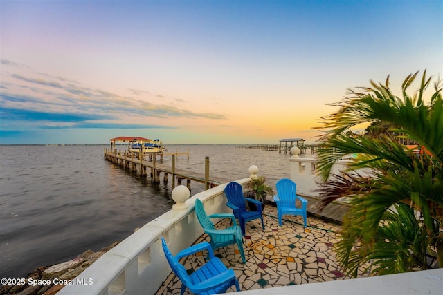 dock area featuring a water view