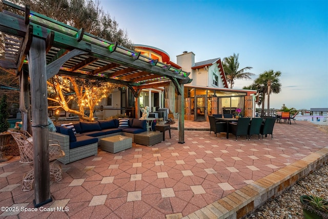 view of patio with outdoor dining area and outdoor lounge area