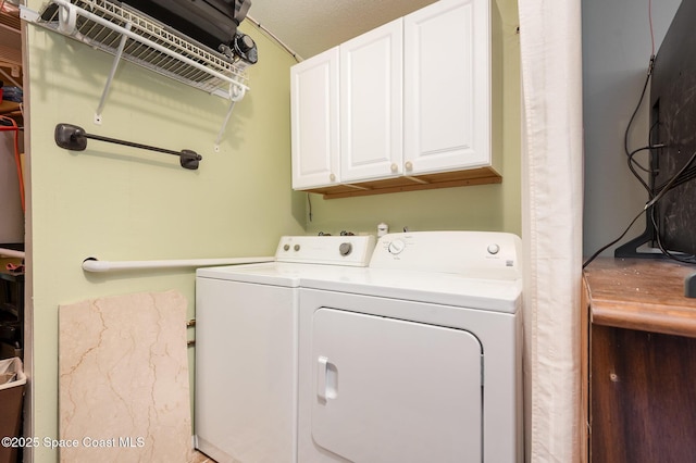 laundry area featuring cabinet space and independent washer and dryer