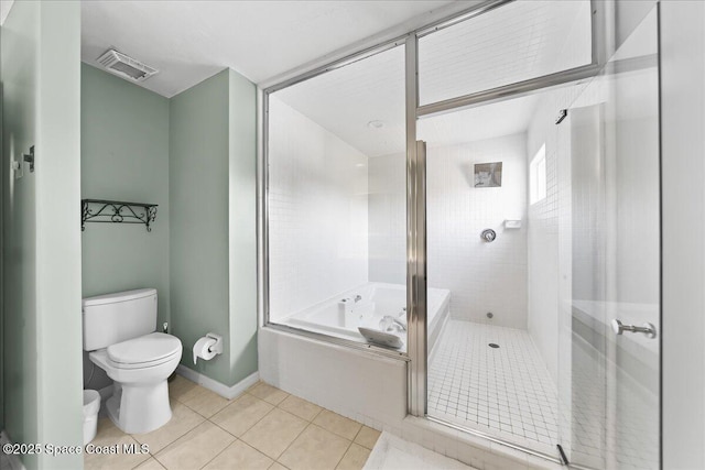 full bathroom featuring visible vents, toilet, tile patterned floors, a shower stall, and a bath