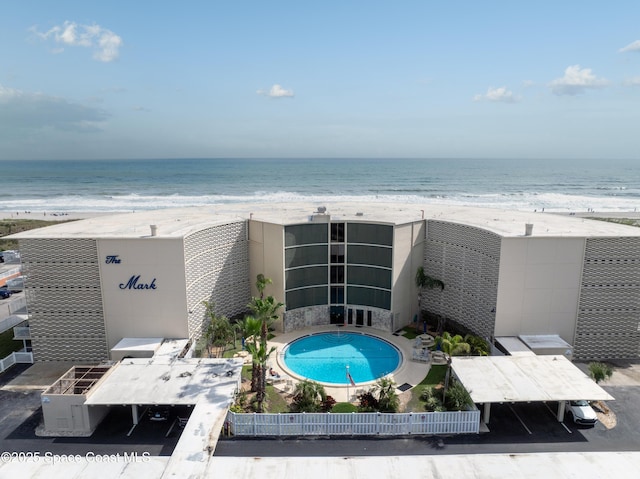 bird's eye view with a view of the beach and a water view