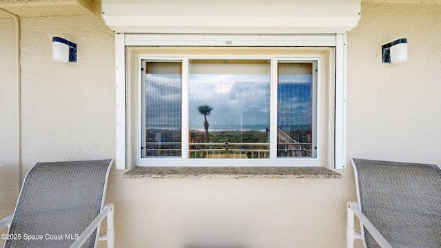 exterior space with stucco siding