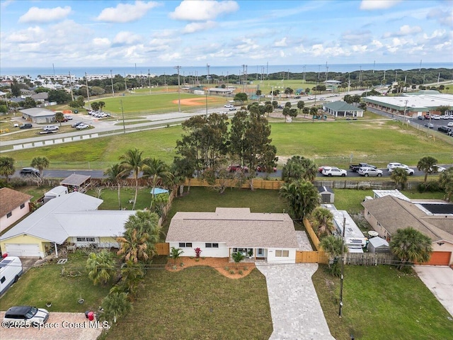 aerial view with a water view and a residential view