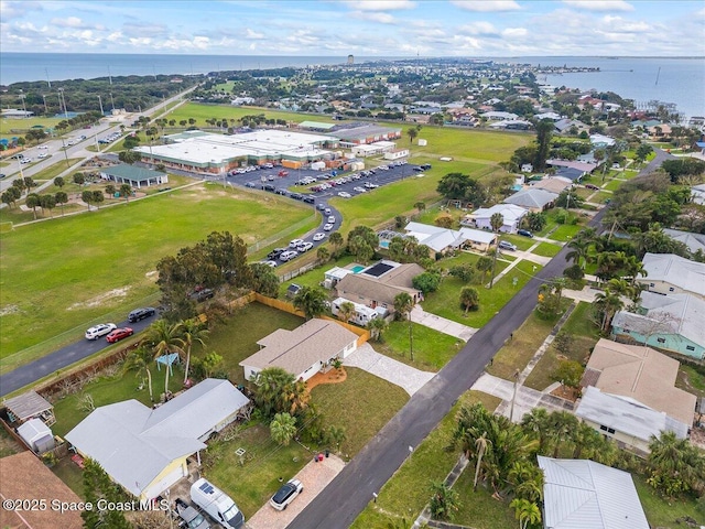 aerial view with a water view and a residential view