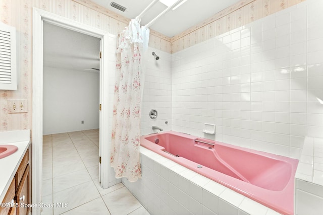 bathroom featuring shower / tub combo with curtain, vanity, and tile patterned floors