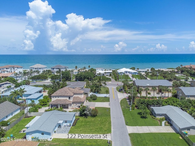 birds eye view of property featuring a water view and a residential view