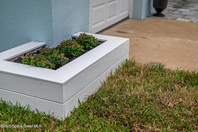 exterior details featuring stucco siding